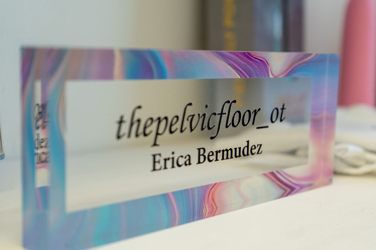 The Pelvic Floor OT, Erica Bermudez desk sign in the Bayonne office