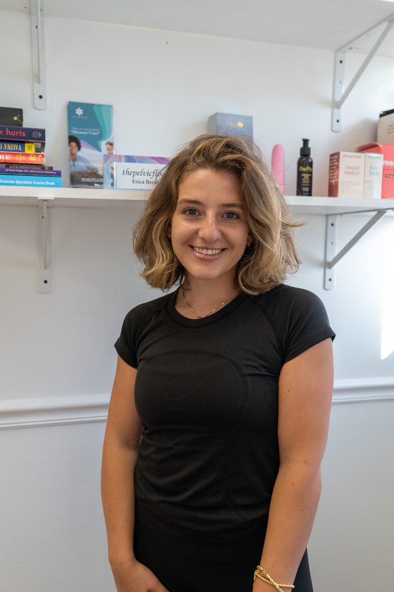 Erica smiling in her Bayonne office